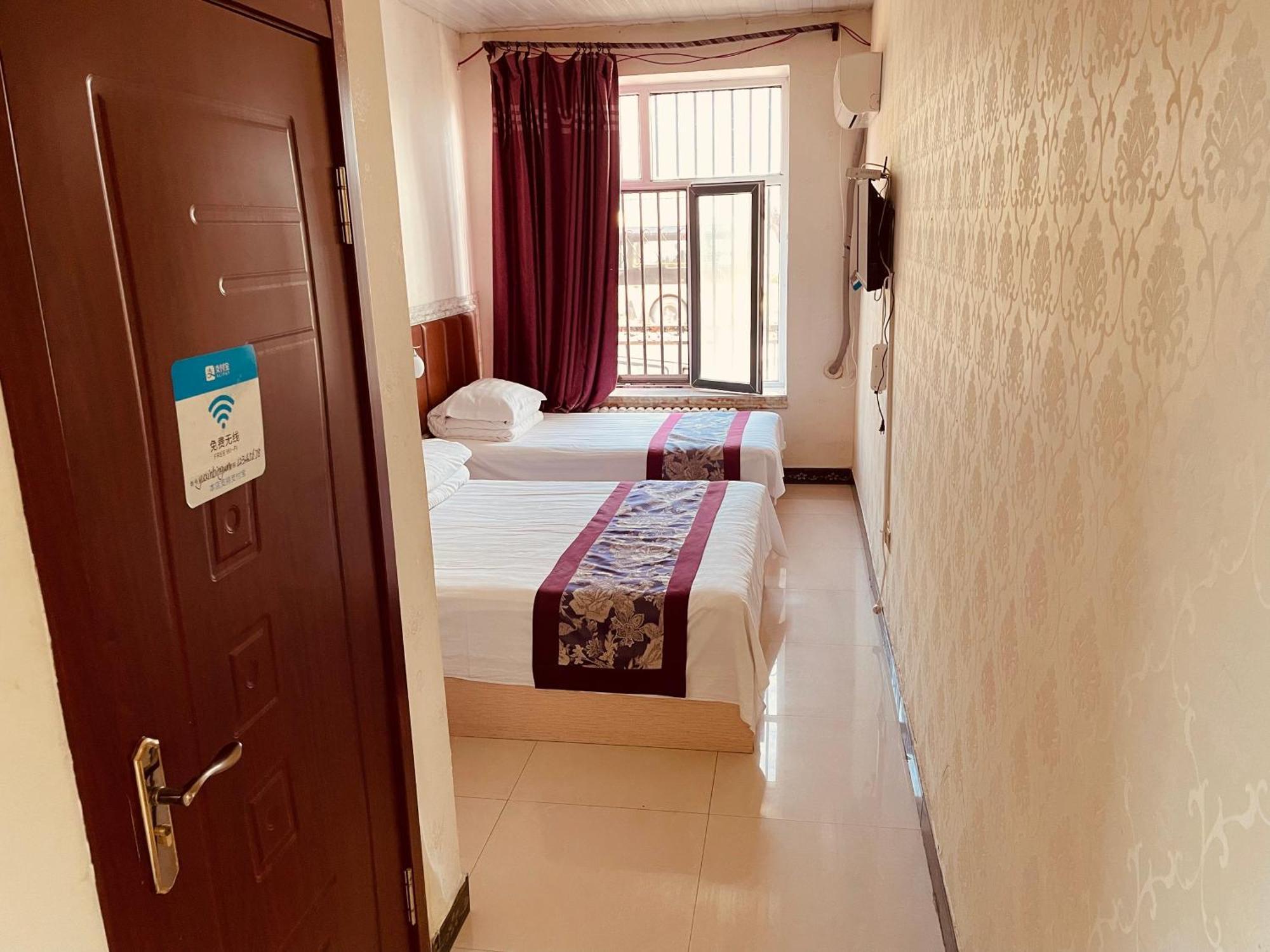 Hotel 哈尔滨机场东方红运宾馆 Habitación foto