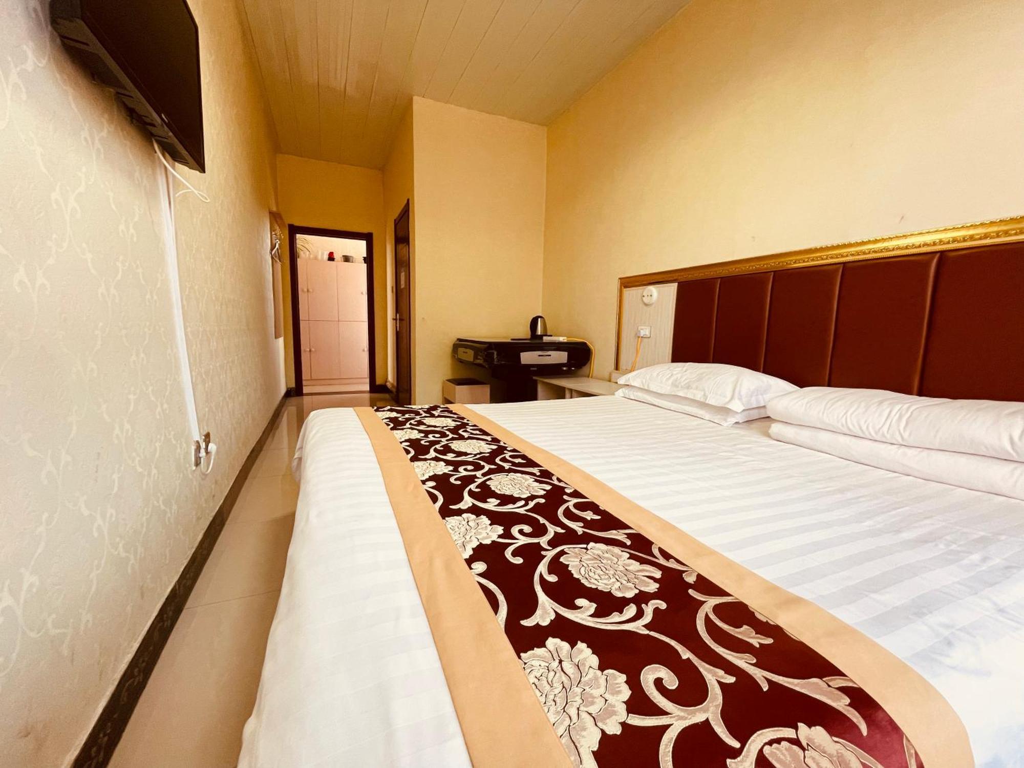 Hotel 哈尔滨机场东方红运宾馆 Habitación foto